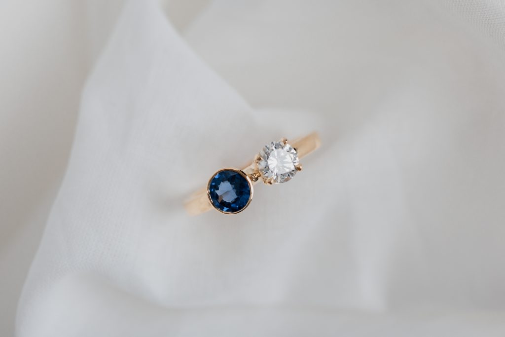A new ring with a diamond and sapphire from old family jewels